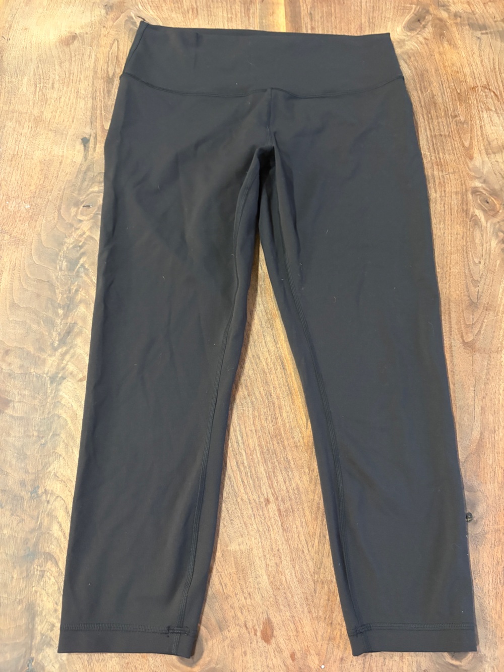 Lululemon size 12 black leggings nice! Base pace 23”